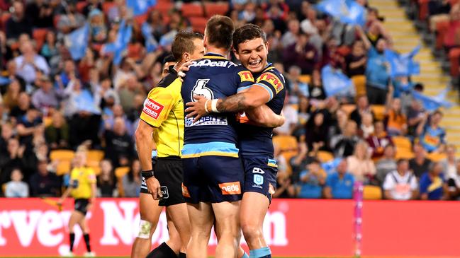 Brimson is congratulated by Ash Taylor after scoring a try. Picture: Getty Images