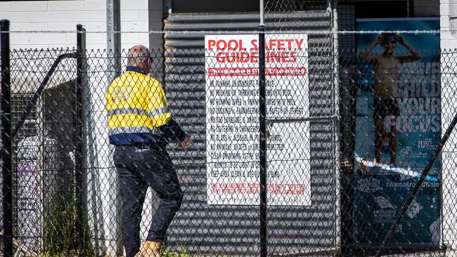 A SafeWork SA inspector at the scene of the tragedy. Picture: Tom Huntley