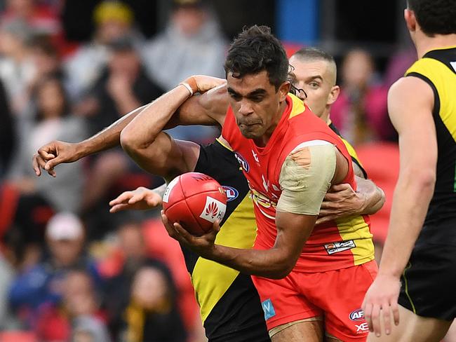 Jack Martin of the Suns in action during the Round 16 AFL match between the Gold Coast Suns and the Richmond Tigers at Metricon Stadium on the Gold Coast, Saturday, July 6, 2019. (AAP Image/Dan Peled)