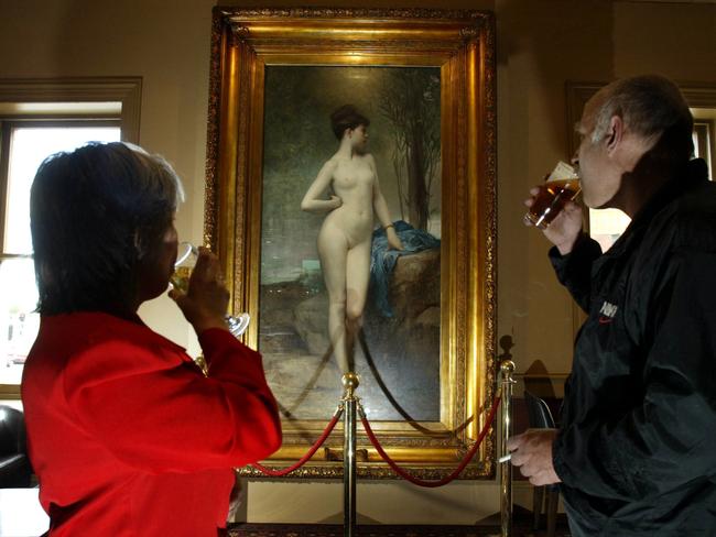 Patrons admire the painting Chloe by Jules Lefebvre at the Young &amp; Jackson Hotel.