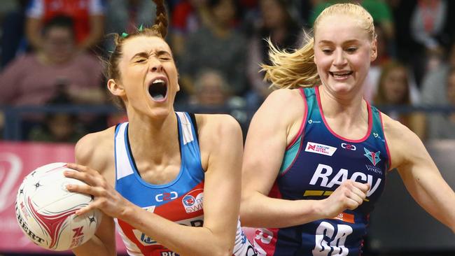 Helen Housby in action against Vixens defender Jo Weston. 