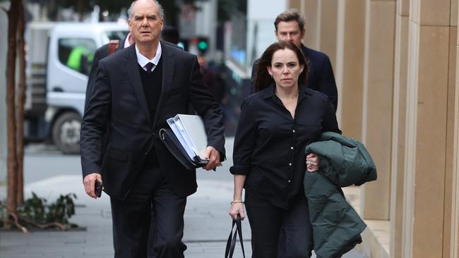 Rebecca Farrell arrives at the Federal Court in Sydney with her lawyer. Picture: John Feder