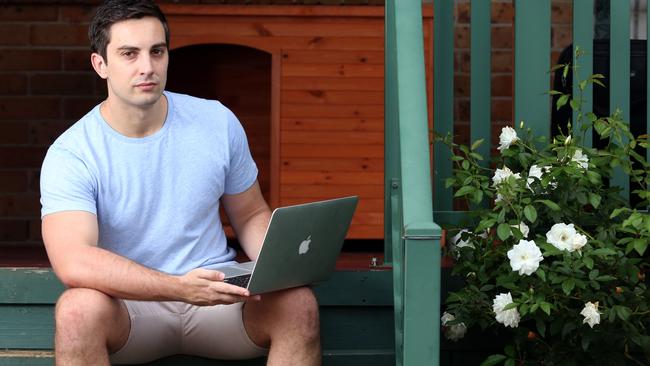 Michael Petith at his home in Glen Alpine, NSW. His NBN connection drops out five to six times a day and neither his provider, iinet, or NBN Co will tell him why. Picture: James Croucher