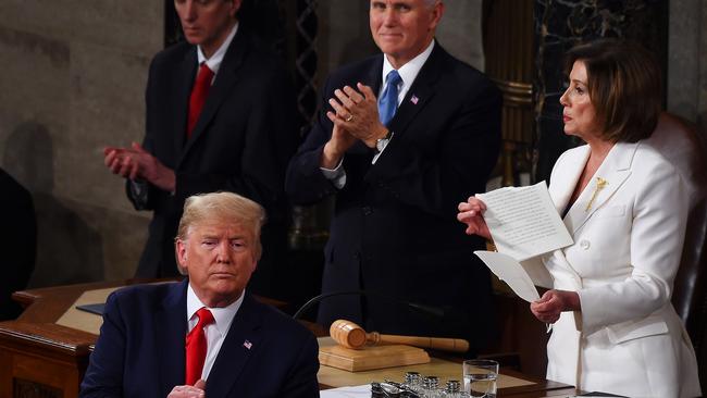 House Speaker Nancy Pelosi tears up a copy of Donald Trump’s speech after his State of the Union address in Washington on Wednesday. Picture: AFP
