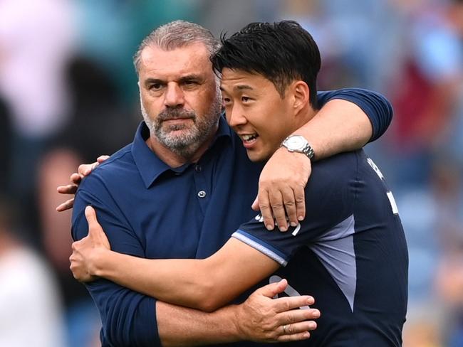 BURNLEY, ENGLAND - SEPTEMBER 02: Ange Postecoglou, Manager of Tottenham Hotspur, embraces Heung-Min Son of Tottenham Hotspur after the Premier League match between Burnley FC and Tottenham Hotspur at Turf Moor on September 02, 2023 in Burnley, England. (Photo by Gareth Copley/Getty Images)