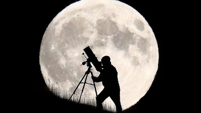 A British astronomer during a super moon. Picture: Jordan Mansfield/Getty Images