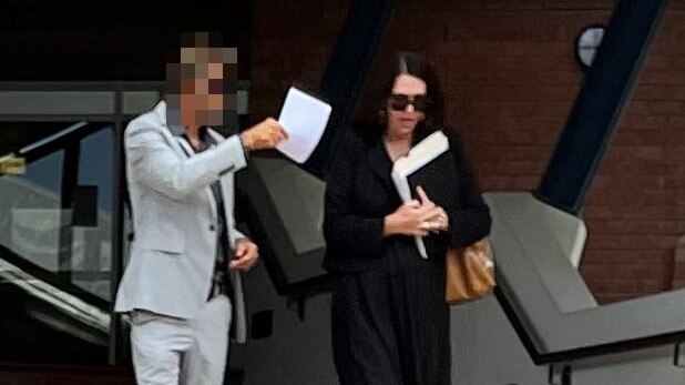 A Moreton Island man, who can't be named for legal reasons, leaves Cleveland Magistrates Court with his lawyer Tania Lacy after pleading guilty to possessing LSD consumed by children by accident. Picture: Marcel Baum