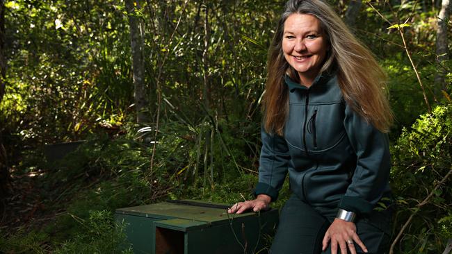 Melanie Tyas, a NPWS ranger, with a Little Penguin nesting box at Store Beach. File picture: Adam Yip / Manly Daily