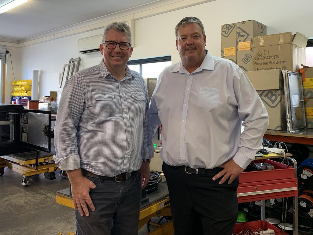 Resources Minister Keith Pitt (left) stands with Dawson Nationals candidate Andrew Willcox at Mackay business Real Time Instruments. Mr Pitt and Mr Willcox said they supported the government's 'technology not taxes' approach to net zero emissions by 2050. Picture: Duncan Evans