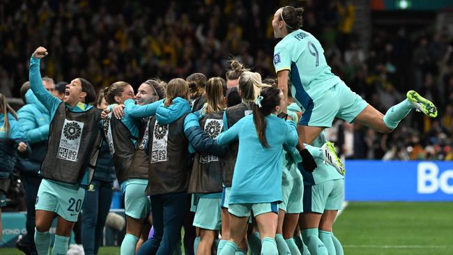 Sam Kerr celebrates after Australia's defender Stephanie Catley scored her team's fourth goal