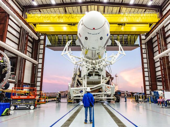 This photo from NASA shows the SpaceX Falcon 9 rocket with the company’s Crew Dragon attached, rolling out of the company’s hangar at NASA Kennedy Space Center’s Launch Complex 39A. Picture: AFP