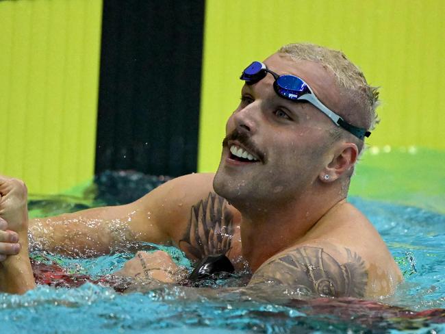 Kyle Chalmers of Australia (R) wins the men's 100m freestyle swimming final at the 2023 Australian World Championship Trials in Melbourne on June 16, 2023. (Photo by William WEST / AFP) / --IMAGE RESTRICTED TO EDITORIAL USE - STRICTLY NO COMMERCIAL USE--