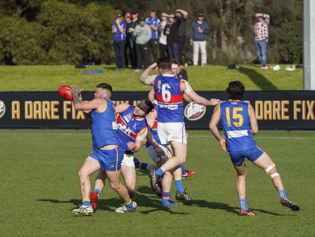 Cranbourne champ Marc Holt with the ball. Picture: Valeriu Campan