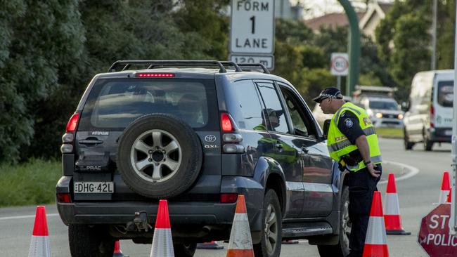 Queensland Police stopping NSW registered vehicles on the Gold Coast Highway at Bilinga due to the coronavirus (COVID-19) threat. Picture: Jerad Williams