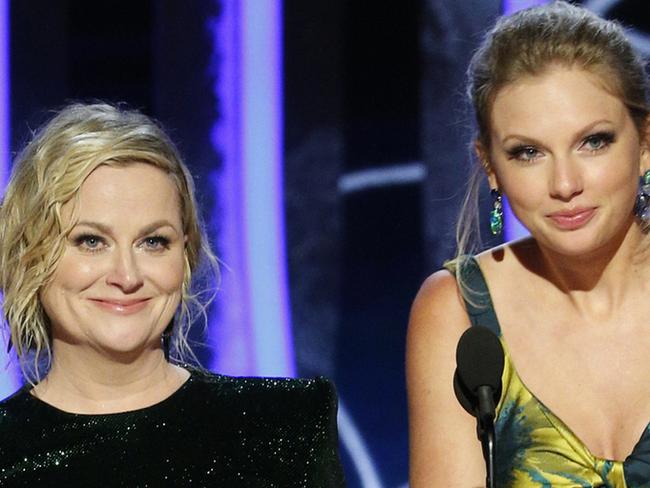 This image released by NBC shows presenters Amy Poehler, left, and Taylor Swift at the 77th Annual Golden Globe Awards at the Beverly Hilton Hotel in Beverly Hills, Calif., on Sunday, Jan. 5, 2020. (Paul Drinkwater/NBC via AP)