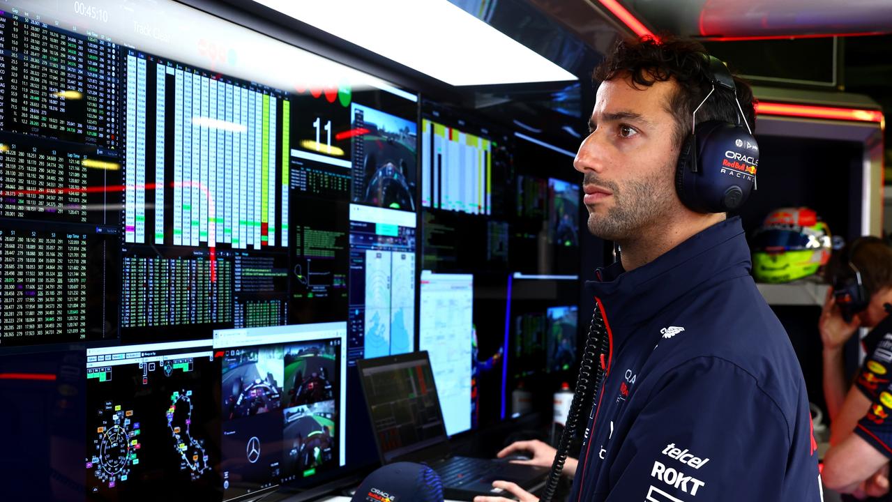 MELBOURNE, AUSTRALIA - APRIL 02: Daniel Ricciardo of Australia and Oracle Red Bull Racing watches the action in the Red Bull Racing garage during the F1 Grand Prix of Australia at Albert Park Grand Prix Circuit on April 02, 2023 in Melbourne, Australia. (Photo by Mark Thompson/Getty Images)