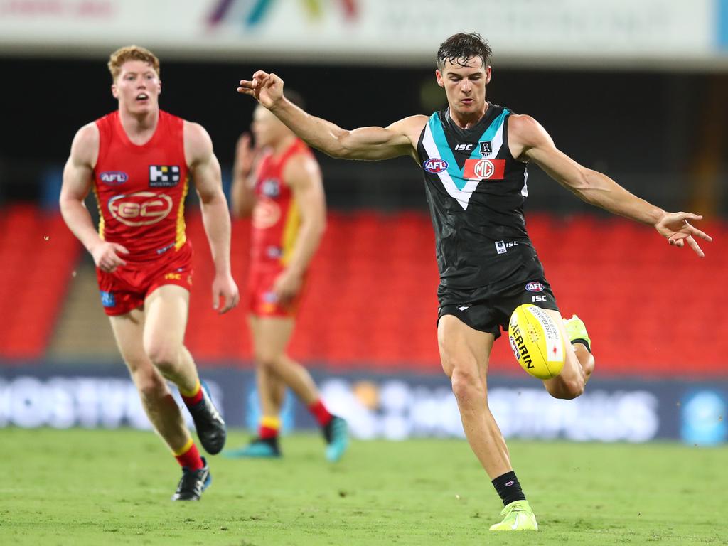 Connor Rozee kicks during the Power’s round one win over the Suns.