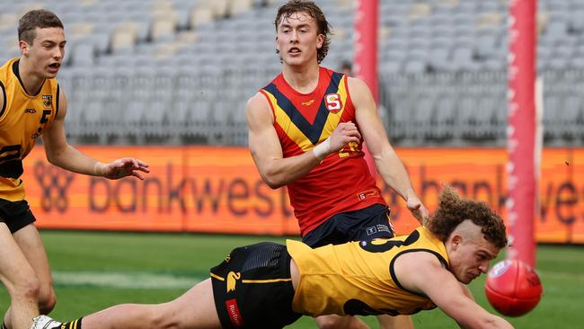 North Adelaide’s Kane McAuliffe has his kick smothered while representing South Australia against Western Australia at the AFL under-18 championships game in Perth. Picture: Will Russell/AFL Photos via Getty Images