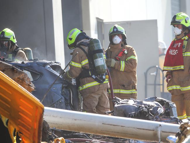 Firefighters are the scene at Essendon Airport. Picture: Ian Currie