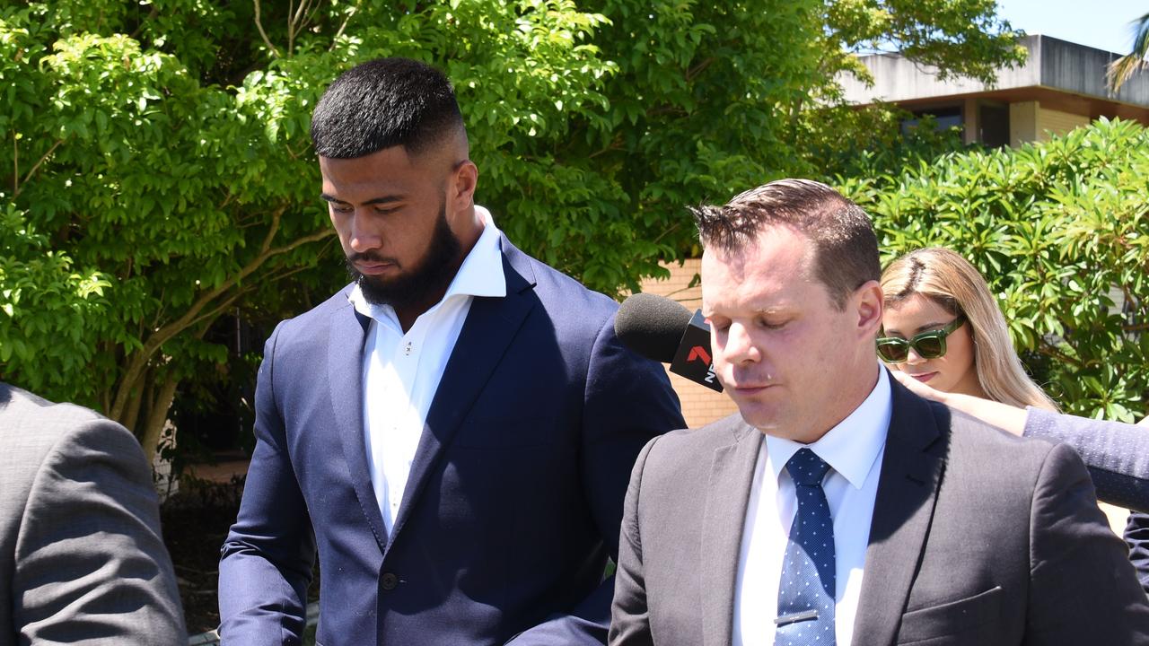 Haas (left in blue suit) leaves court with his legal team and partner after receiving a good behaviour order. Picture: NCA NewsWire / Steve Holland