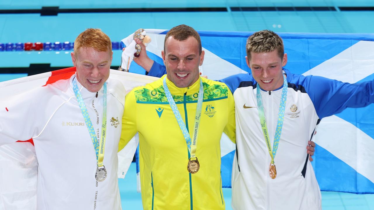 Silver medallist, Tom Dean, Chalmers bronze medallist, Duncan Scott celebrate after the 100m freestyle. Picture: Clive Brunskill/Getty Images