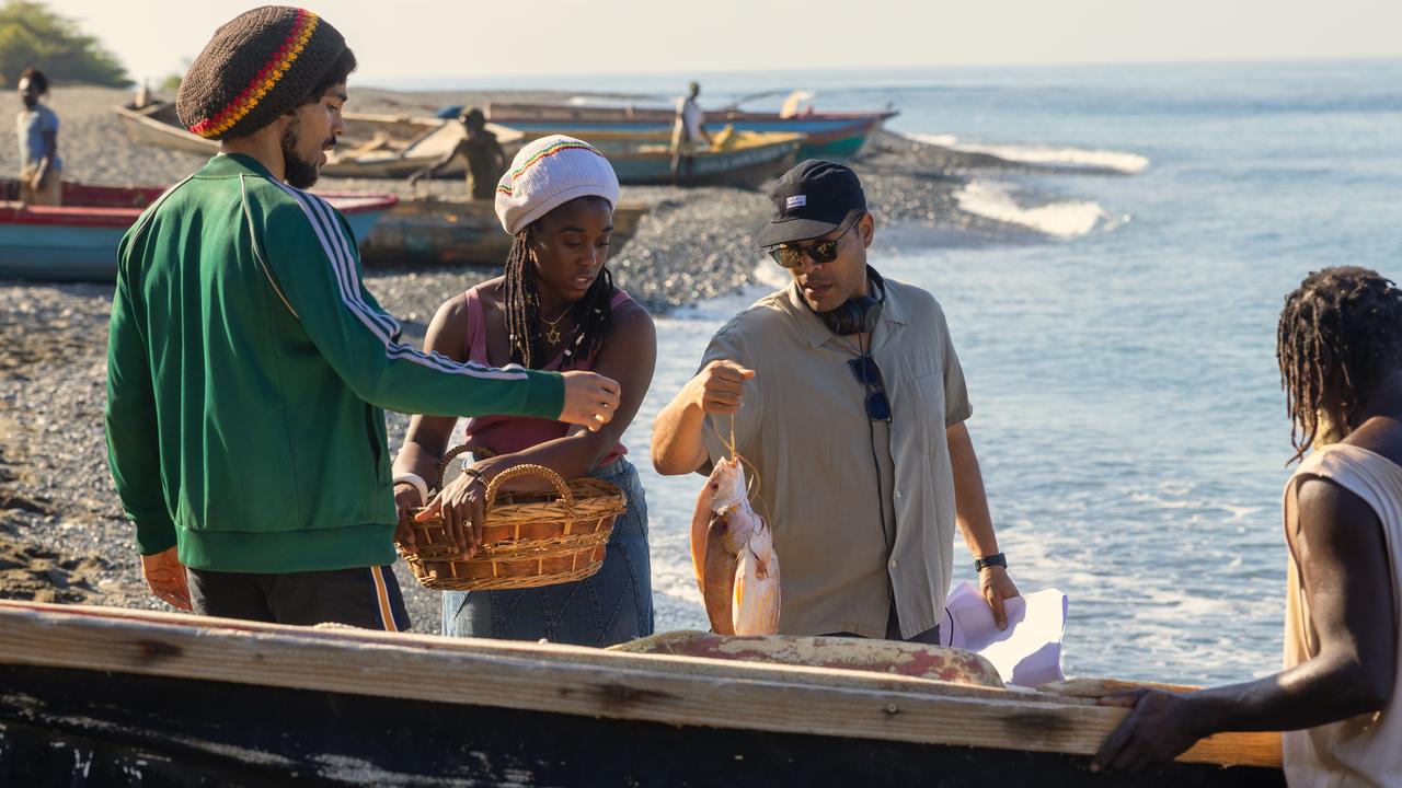 Kingsley Ben-Adir, Lashana Lynch and director Reinaldo Marcus Green on set.