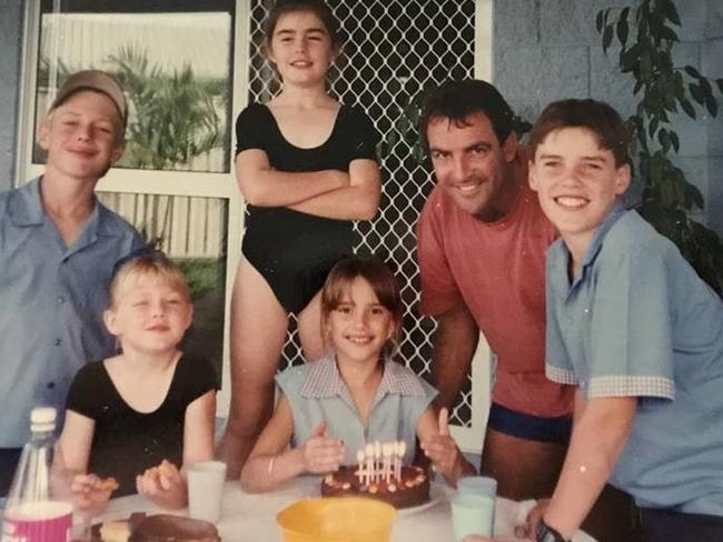 Rachael Finch, as a child with her dad Steve and the rest of their family. Picture: Supplied