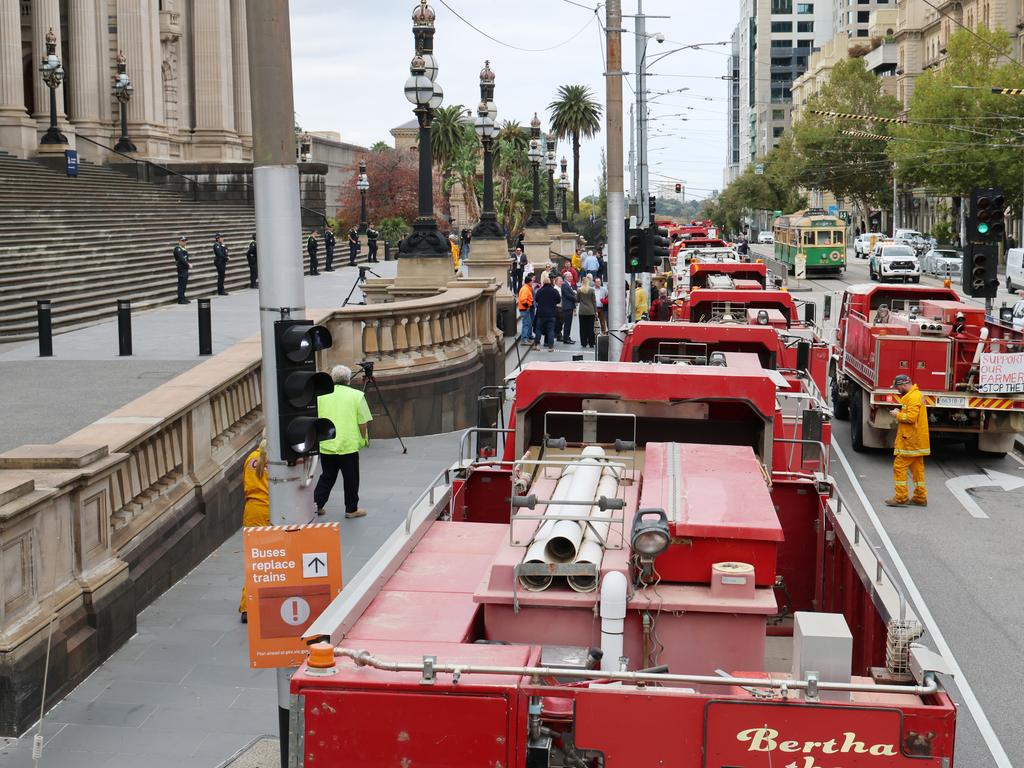 Farmers and CFA members gather in front of the Victorian Parliament. Picture: David Crosling