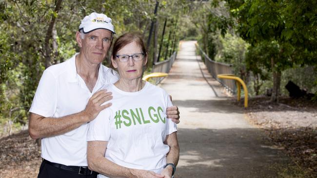 North Lakes residents David and Margaret Orr at a walking track that passes through the golf course. (AAP Image/Renae Droop)