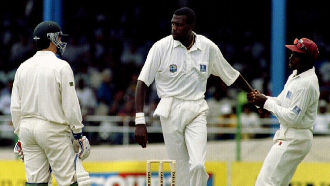 Big, angry Curlty Ambrose, held back from then-Aussie captain Steve Waugh by then-West Indies captain Richie Richardson in 1995.