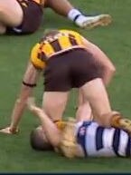 James Sicily drops a knee on Joel Selwood.