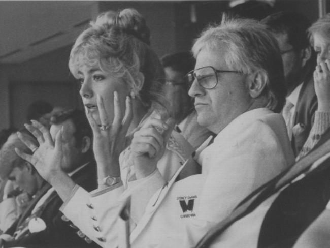 Edelsten and Leanne watch a game in 1986.