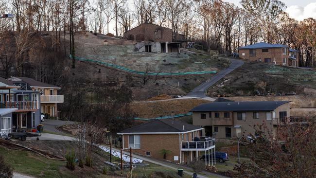 View of homes and burnt out properties on Ocean View Terrace in Tathra, NSW, that was ravaged by a bushfire on 18 March 2018. Picture: Sean Davey