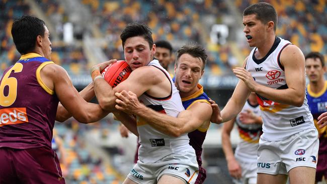 Chayce Jones had a crack in the middle but also worked back to help out his defenders. Picture; Darren England (AAP).