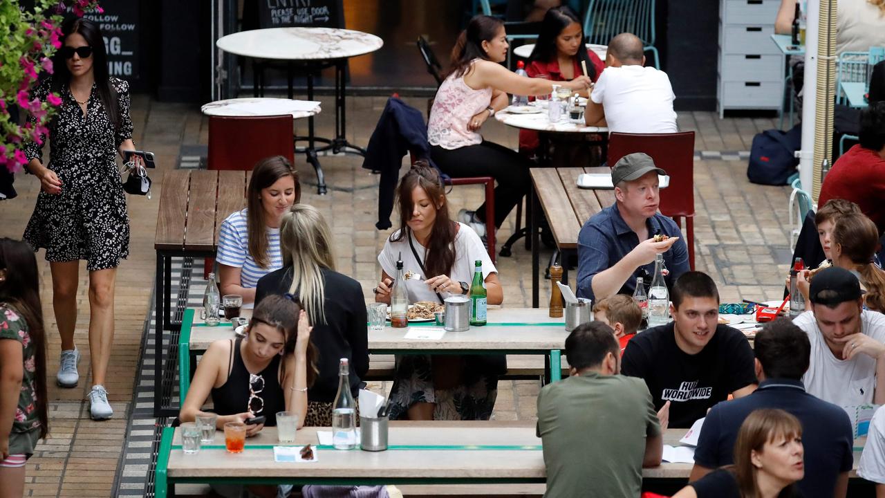 Diners sit at tables outside a restaurant in London on August 3, 2020, as the Government's "Eat out to Help out" coronavirus scheme gets underway. Picture: Tolga Akmen/AFP