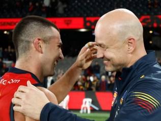 MELBOURNE, AUSTRALIA - JULY 19: Josh Rachele of the Crows and Matthew Nicks, Senior Coach of the Crows celebrate during the 2024 AFL Round 19 match between the Essendon Bombers and the Adelaide Crows at Marvel Stadium on July 19, 2024 in Melbourne, Australia. (Photo by Michael Willson/AFL Photos via Getty Images)