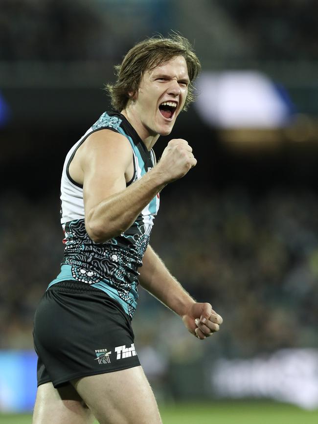 Power’s Jared Polec celebrates a goal against Richmond on Friday night. Picture Sarah Reed