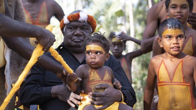 Dr Galarrwuy Yunupingu AC with Gumatj boys at Garma, 2019. Picture: Peter Eve / Yothu Yindi Foundation