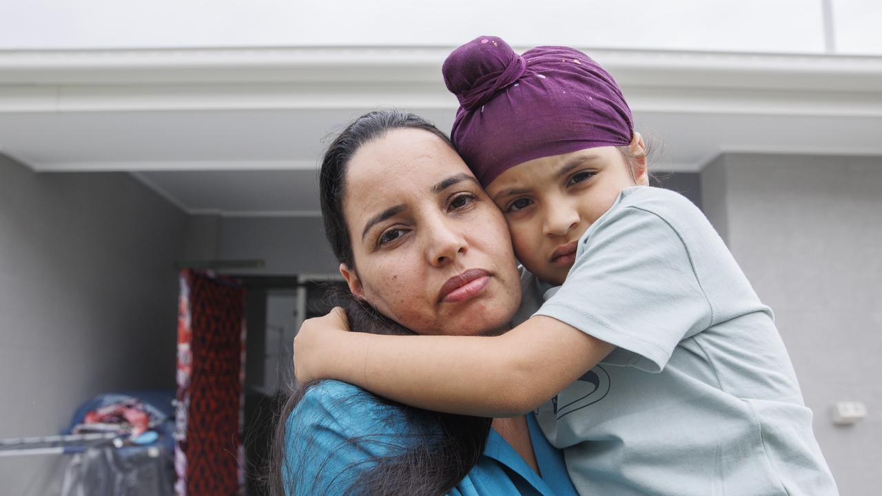 Karamjat Kaur, with her son Fatehsher Pannu 5, has been unable to sleep since learning her new home might be resumed. Picture Lachie Millard