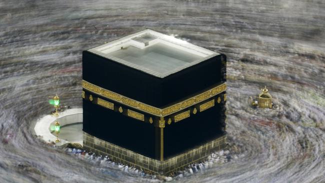 In a photoraph taken with slow shutter speed, pilgrims circumambulate the Kaaba, the cubic building at Mecca’s Grand Mosque last August. Picture: AP