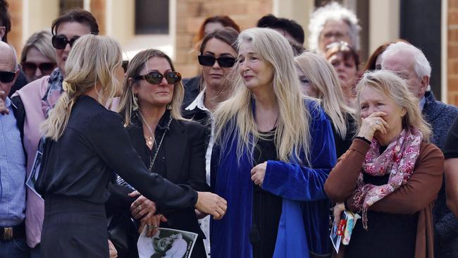 Brooke Sorlie’s mother Kathleen O’Sullivan (in blue) is comforted by family and friends at the funeral of her daughter. Picture: Sam Ruttyn