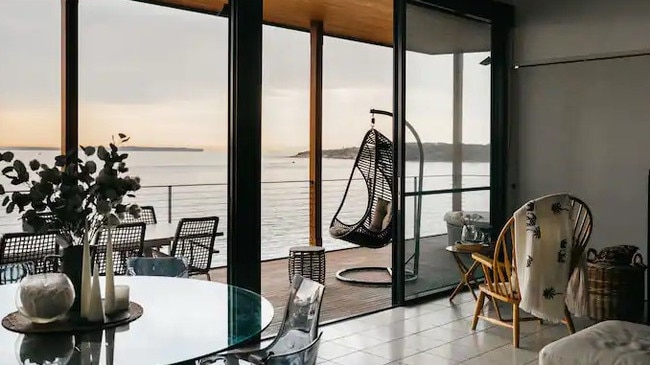 Owned by a Superhost, this beachside abode offers unbeatable sunset views. Picture: Airbnb