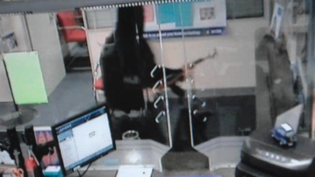 Surveillance video footage a robbery at the BankSA branch at Willunga suspected of being the work of the Bicycle Bandit.