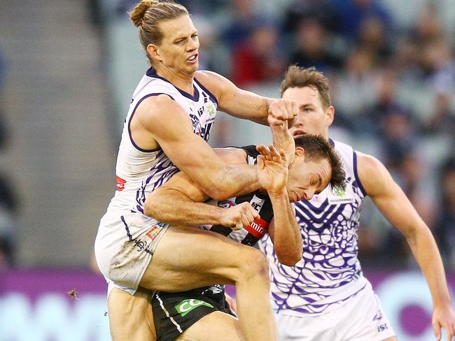 Nat Fyfe collects Levi Greenwood with a high bump. Picture: Getty Images