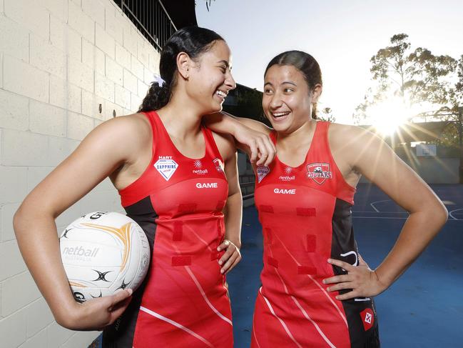 Jayden Molo, 17, and Tia Molo, 15, pictured at St Peters Lutheran College, Brisbane 10th May 2023. They play netball for ACU Brisbane North Cougars. (Image/Josh Woning)