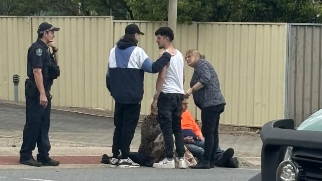 Family and friends, believed to be of the motorcyclist, soon arrived on the scene and appeared to be visibly distraught by the situation, and were seen comforting and hugging each other. Picture: The Advertiser