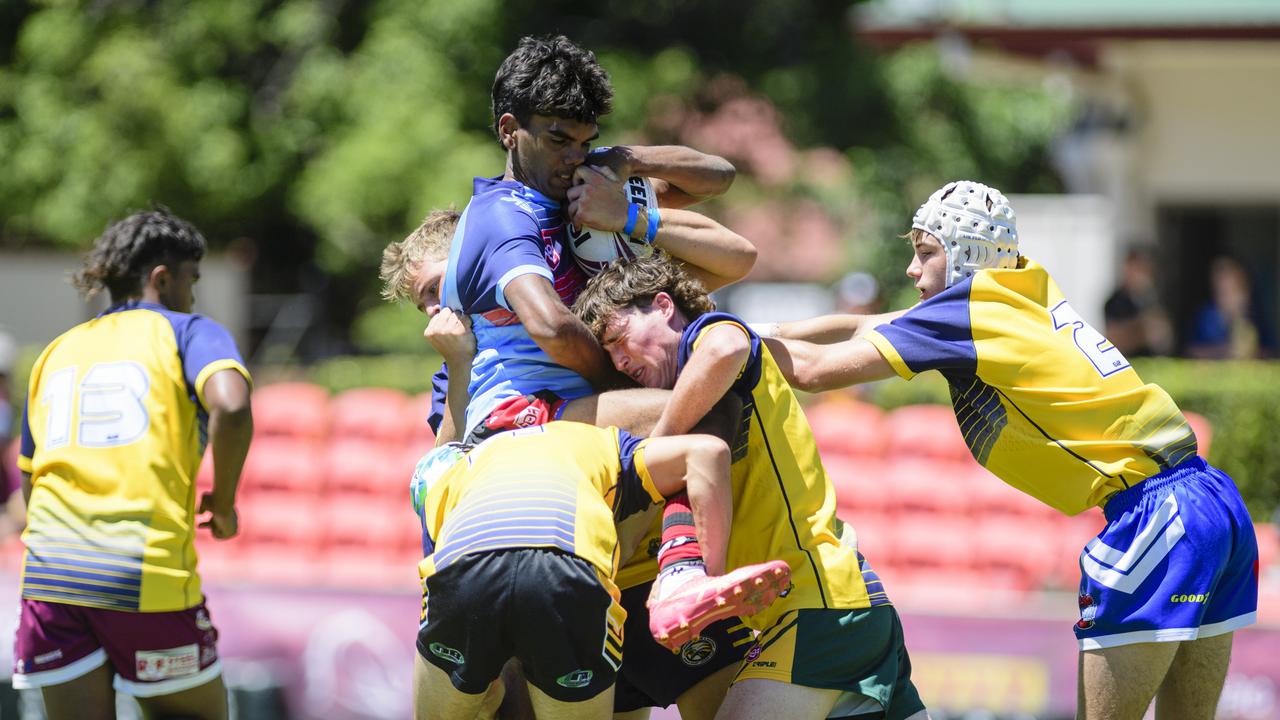 Leroy Malone of City is driven back by Country defenders in Western Clydesdales rugby league at Toowoomba Sports Ground, Sunday, February 16, 2025. Picture: Kevin Farmer