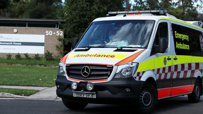 An New South Wales ambulance leaves Newmarch House. Picture: Getty Images