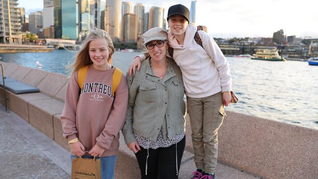 Lisa Vowles and her daughters Matilda and Darcy Henning, came to Sydney on a holiday despite Covid restrictions. Picture: Ryan Osland