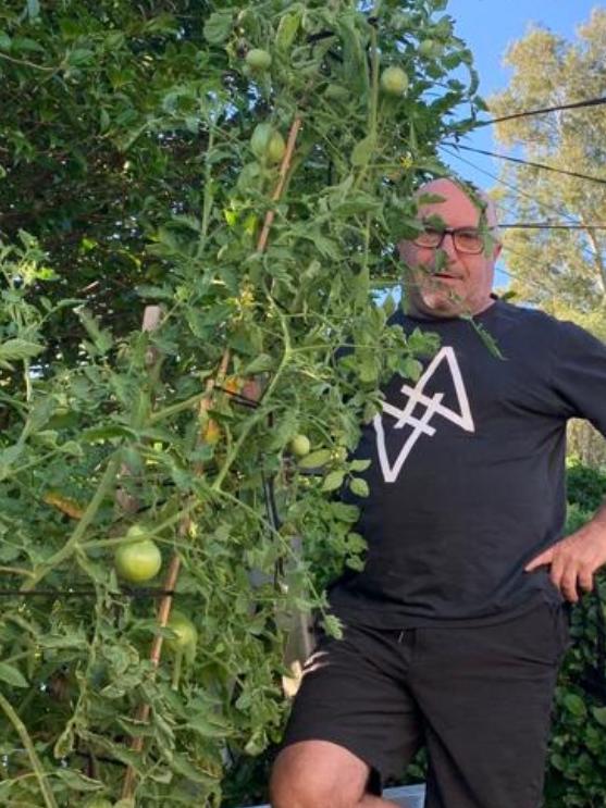 Lisa's Uncle Carl Tobia with his beautiful tomatoes.